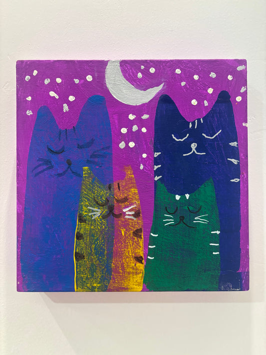 Gatos bajo la Luna